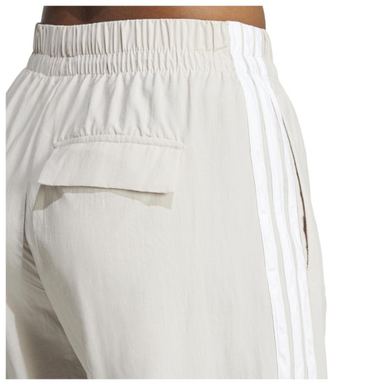 Adidas Γυναικείο παντελόνι φόρμας Sportswear Essentials 3-Stripes Woven Pants